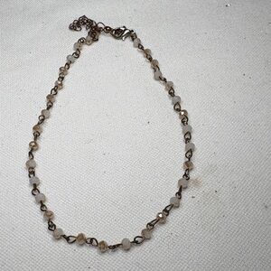 Elegant Beaded Necklace in Silver and White.